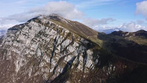 mountainside-smooth-by-glaciers-in-upper-Trentino-Garda,-aerial-view,-geology