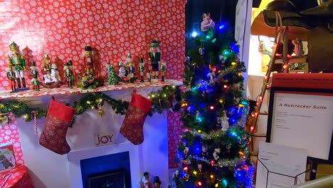 Holiday-Room-Display-with-Tree-and-Fireplace-at-Quad-Cities-Festival-of-Trees