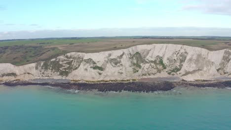 close-up-Aerial-drone-shot-towards-the-white-cliffs-of-dover-over-the-sea