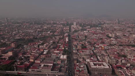 Flight-over-Mexico-city-downtown-with-very-high-pollution-levels