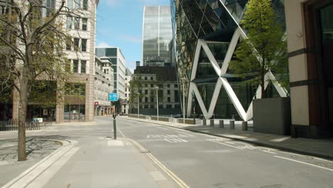 Lockdown-in-London,-deserted-streets-below-in-The-Gherkin-skyscraper-courtyard,-during-the-Coronavirus-pandemic-2020
