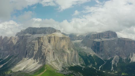 Majestic-mountain-range-in-Dolomites,-South-Tyrol,-Italy,-Aerial-pan