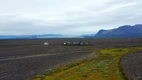 Tourists-At-The-Famous-Skeidara-Bridge-Remains-In-Svartifoss,-Iceland