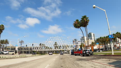 Driving-through-Long-Beach,-California-and-its-iconic-streets-and-through-the-Pike