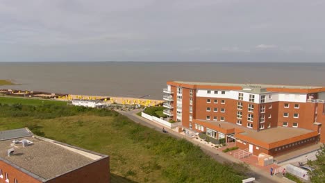drone-shot-of-a-hotel-at-the-north-sea