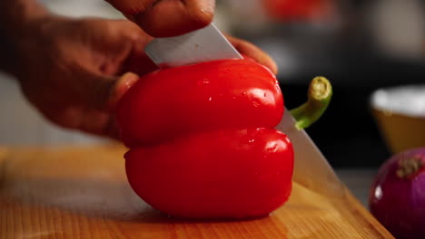 Red-Bell-Pepper-being-cut-up-in-slow-motion