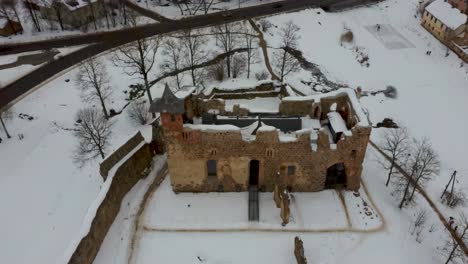 Ruins-of-Ancient-Livonian-Order's-Stone-Medieval-Castle-Latvia-Aerial-Drone-Top-Shot-From-Above