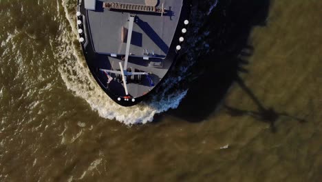 Aerial-Birds-Eye-View-Over-Forward-Bow-Of-Colorado-Cargo-Container-Ship-Navigating-Oude-Maas-In-Zwijndrecht