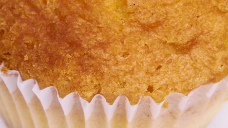 Detail-shot-of-simple,-healthy-and-traditional-muffin-freshly-baked-rotating,-close-up-view-in-4k