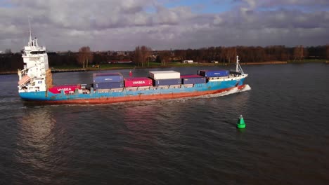 Aerial-View-Of-Greetje-Cargo-Ship-Navigating-Oude-Maas