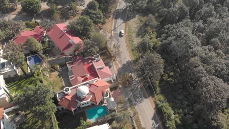 drone-shot-,-zenithal-aerial-view-of-a-road-in-a-residential-area