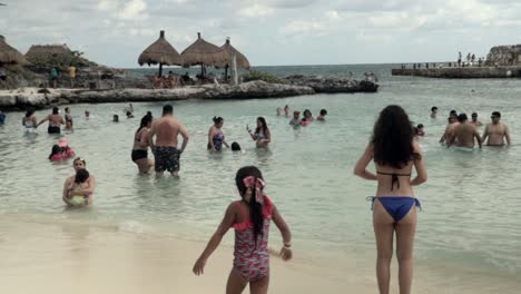 Families-Gathering-at-Inlet-Beach-in-Xcaret-Park-Mexico
