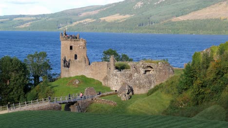 Urquhart-Castle-at-sunset-near-Drumnadrochit-city-in-Scotland-Highlands-with-strong-shadows