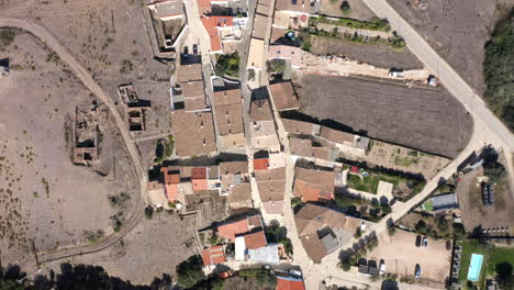 Aerial-drone-flight-top-down-view-of-city-in-Aljezur,-Algarve,-Portugal