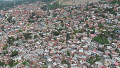 Aerial-View-Of-Crowded-Houses-And-Buildings-In-Comuna-13,-Medellin,-Colombia