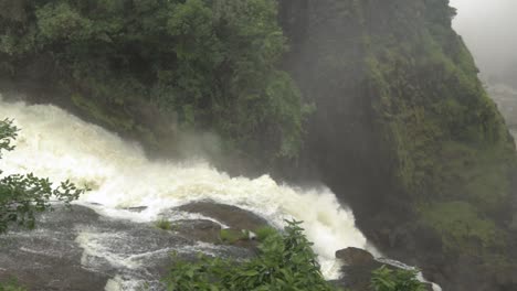 Top-of-Victoria-falls-in-rain-season,-waterfall-is-full-of-water,-everywhere-is-mist