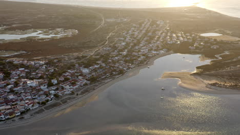 Scenic-View-Of-Island-Armona-In-Portugal-In-The-Sunrise---aerial-shot