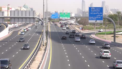 Traffic-on-Highway-in-Suburbs-of-Dubai-UAE-with-Exit-to-Abu-Dhabi,-Sheikh-Zayed-Road,-Static-View