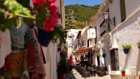 Rack-Focus-View-Looking-Along-Narrow-Street-With-White-Facade-Houses-In-Spanish-Town-Mijas