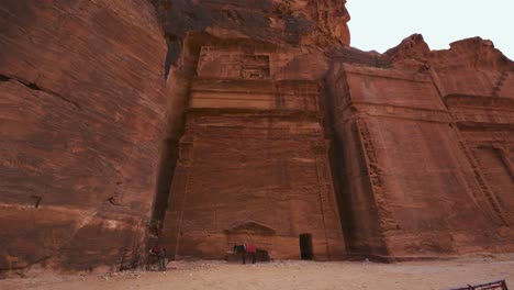 Majestic-Royal-Tombs-in-Petra-close-to-The-Treasury-Khaznet,-historic-UNESCO-heritage-site-carved-into-red-rock-sandstone-in-Jordan