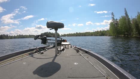 Front-deck-of-bass-fishing-boat-while-floating-on-a-Lake-Vermilion-on-summer-day-in-northern-Minnesota
