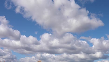 White-fluffy-clouds-in-blue-sky-over-Suffolk-coastline-UK