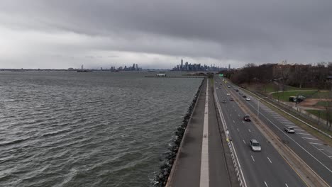 An-aerial-view-over-the-paved-walkway-along-the-Belt-Parkway-by-Upper-Bay-in-Brooklyn-NY
