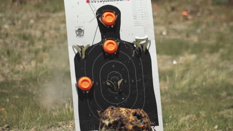 Outdoor-shooting-range-target-taking-hits,-being-shot-at,-close-up,-Series