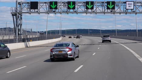 Cars-drive-on-toll-interstate-bridge