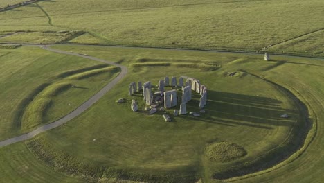 Stonehenge,-green-fields-and-shadows-from-above-with-a-warm-summery-feeling