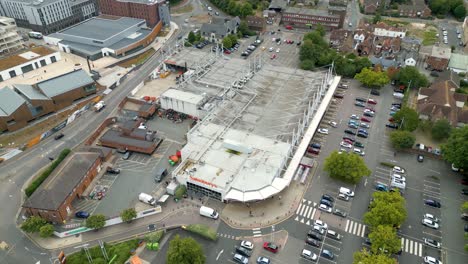 Rotating-aerial-shot-of-a-supermarket-in-Canterbury