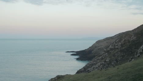 Evening-view-along-rocky-coastline-in-Pembrokeshire-Wales