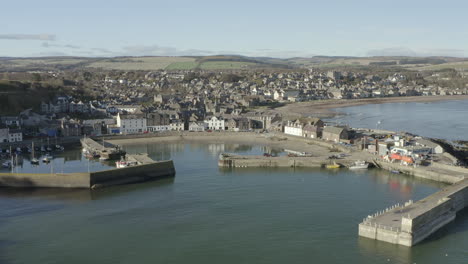 An-aerial-view-of-Stonehaven-town-and-harbour-on-a-sunny-day,-Aberdeenshire,-Scotland