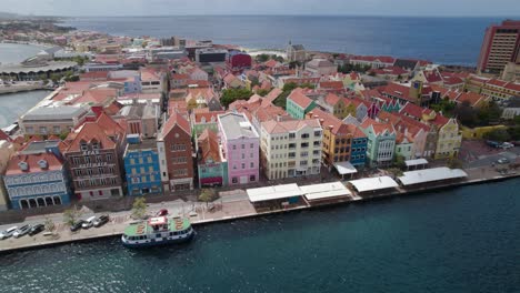 Aerial-orbit-over-the-Punda---historical-center-of-Willemstad,-Curaçao