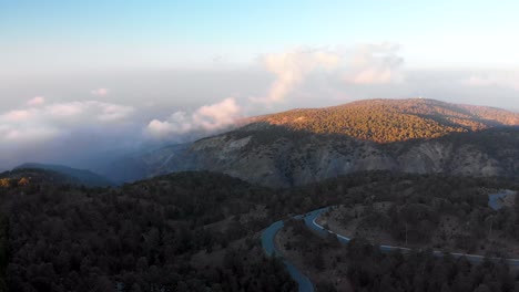 Rising-aerial-drone-shot-of-Mount-Olympus-at-sunrise