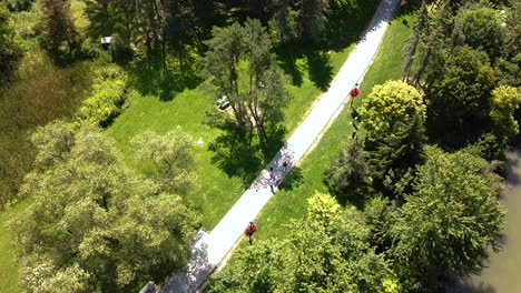 Drone-flying-over-a-trail-in-a-beautiful-park