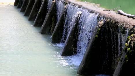 In-the-hot-summer-months,-this-small-dam-across-any-number-of-old-Texas-waterways-would-be-struggling-to-move-any-water-over-the-spillway-at-all