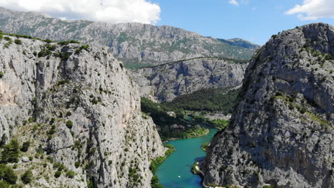Aerial-drone-shot-of-the-Cetina-river-and-the-canyon-near-the-town-of-Omiš,-Croatia