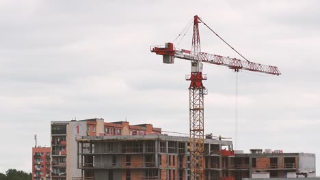 Working-crane-on-real-estate.-Construction