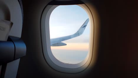 Passenger-view-through-an-airplane-window