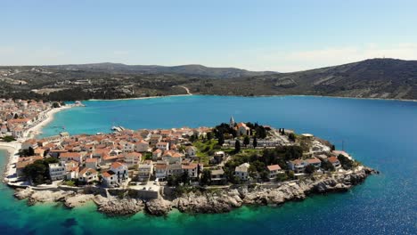 A-drone-shot-of-the-town-of-Primosten,-Croatia