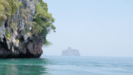 Ultra-slow-motion-shot-of-limestone-cliffs-in-water-in-Thailand