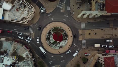 Aerial-clip-of-traffic-slowly-moving-along-Yossi-Carmel-Square-roundabout-in-Jaffa-Israel