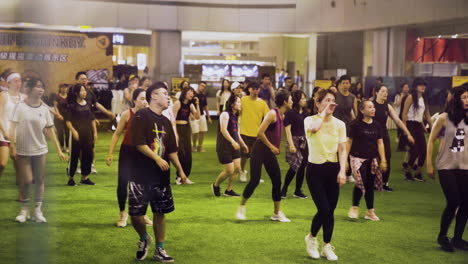 A-Group-of-People-Dancing-on-the-Field-at-the-Shopping-Mall