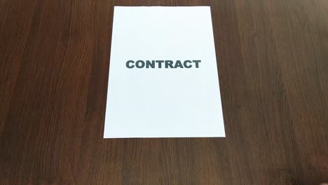 Vertragsunterzeichnung-Auf-Einem-Weißen-Papier