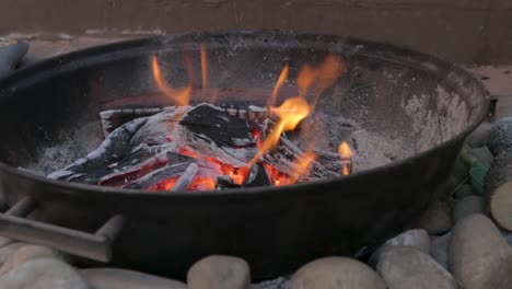 Timelapse-of-a-fire-going-through-the-stages-for-a-barbeque