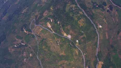 Top-down-shot-over-the-misty-mountains-of-northern-Vietnam