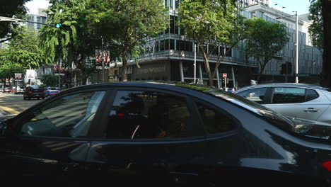 Singapore---Circa-Dolly-zoom-time-lapse-of-the-busy-orchard-road-crossroad-at-Singapore-city