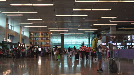 Singapore---Circa-Time-lapse-of-crowd-of-travelers-inside-a-busy-Singapore-airport
