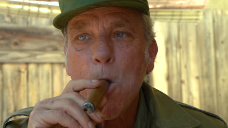Senior-citizen-puffing-a-cigar
